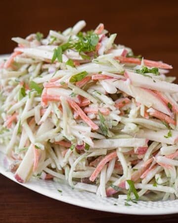 Easy Broccoli Slaw with a homemade creamy dressing is a side salad that takes only minutes to make and is perfect for any summer time gathering.