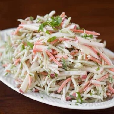 Easy Broccoli Slaw with a homemade creamy dressing is a side salad that takes only minutes to make and is perfect for any summer time gathering.