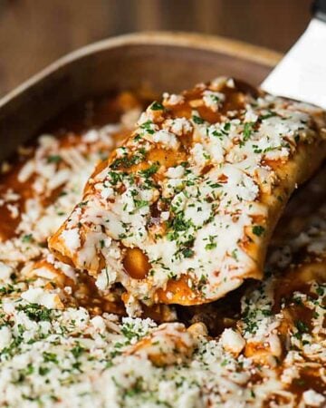 a scoop of easy ground beef enchiladas