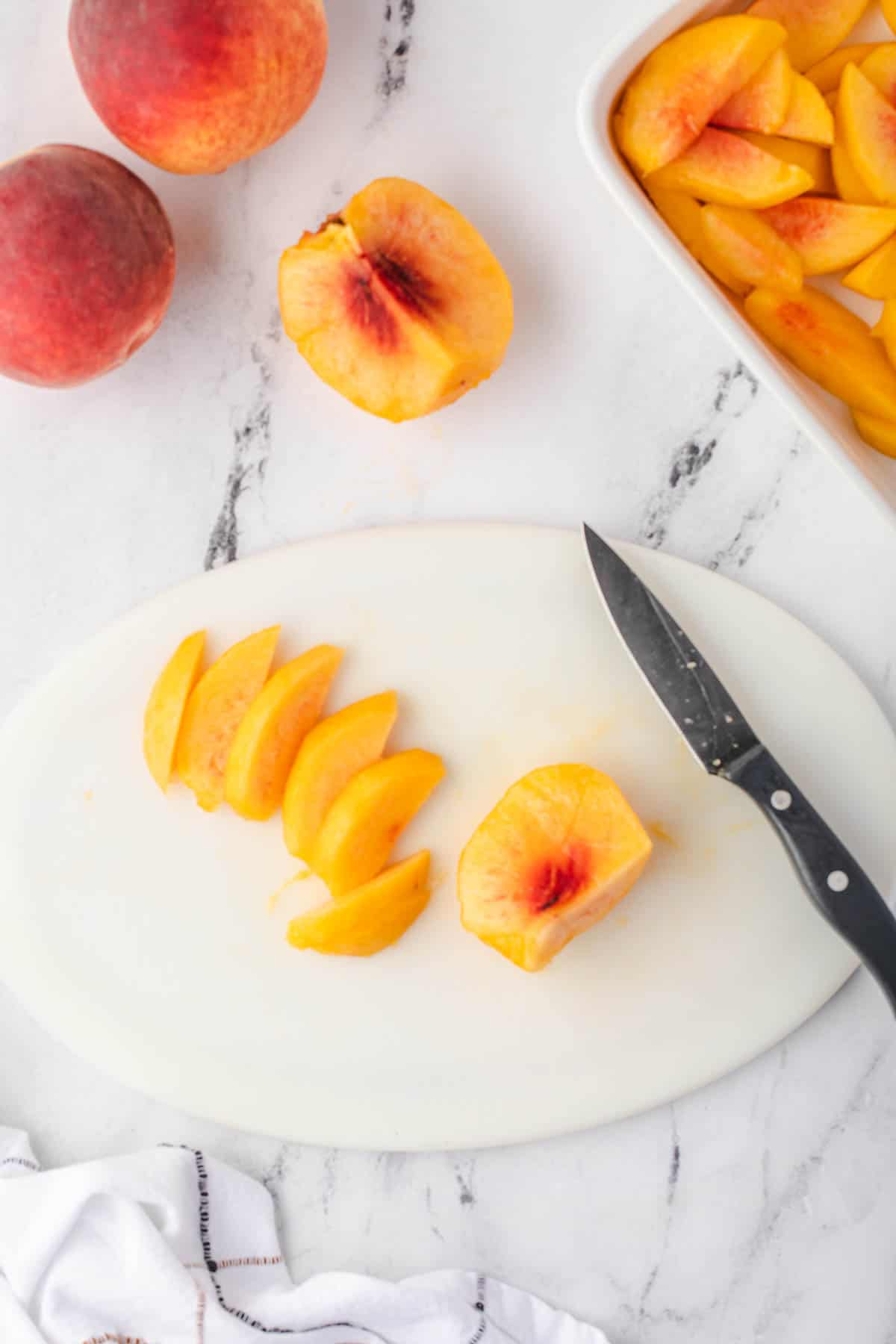 slicing a fresh peach