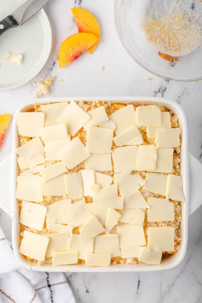 thin slices of butter on crumb topping