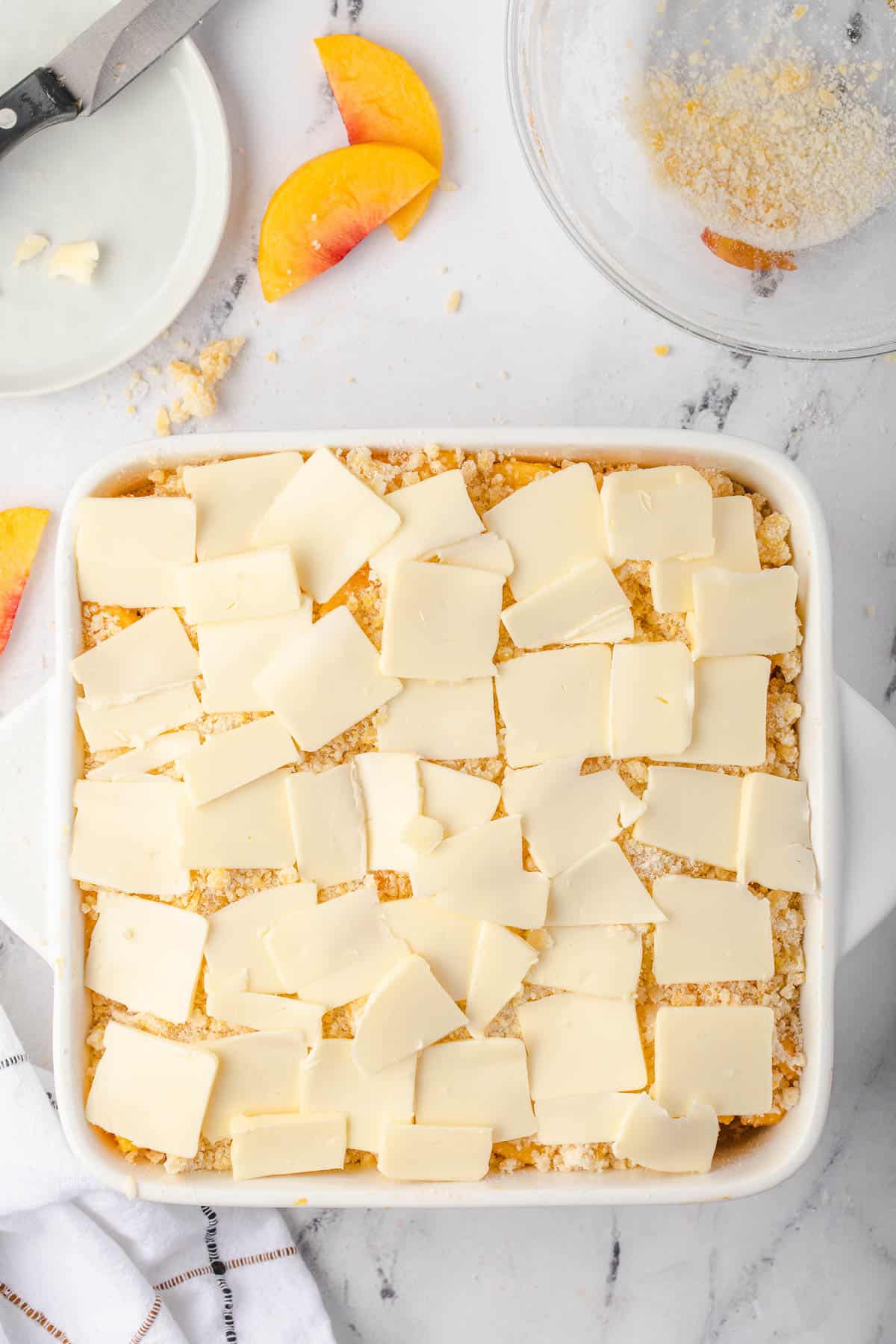 thin slices of butter on crumb topping
