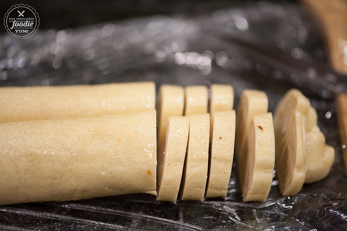 cutting homemade Palmier dough into slices