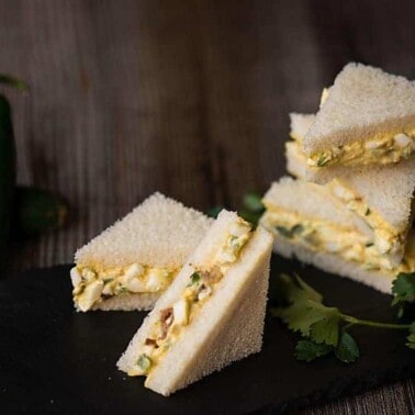 Whether you're preparing a fancy afternoon tea or a game day feast, Mini Bacon Jalapeno Egg Salad Sandwiches are sure to please!