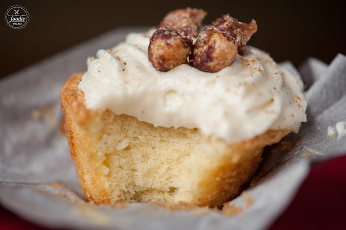 a bite taken out of an eggnog cupcake