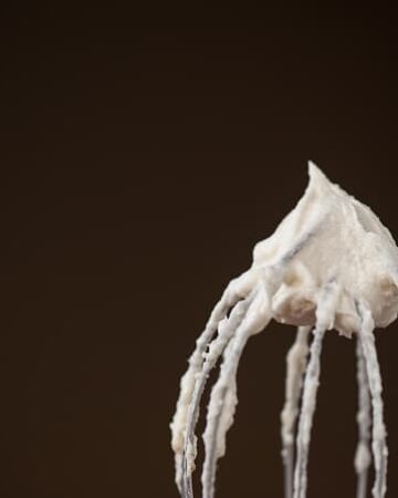 This Eggnog Frosting is a traditional butter frosting with the delicious addition of eggnog, vanilla, and nutmeg. Its perfect for any holiday treat.