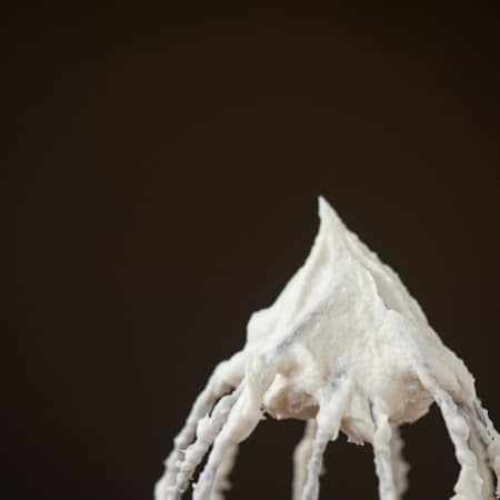 This Eggnog Frosting is a traditional butter frosting with the delicious addition of eggnog, vanilla, and nutmeg. Its perfect for any holiday treat.