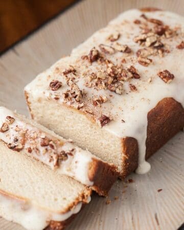 Use that leftover eggnog to make the perfect holiday treat - a rich and tasty Eggnog Poundcake complete with an eggnog glaze and crushed candied pecans.