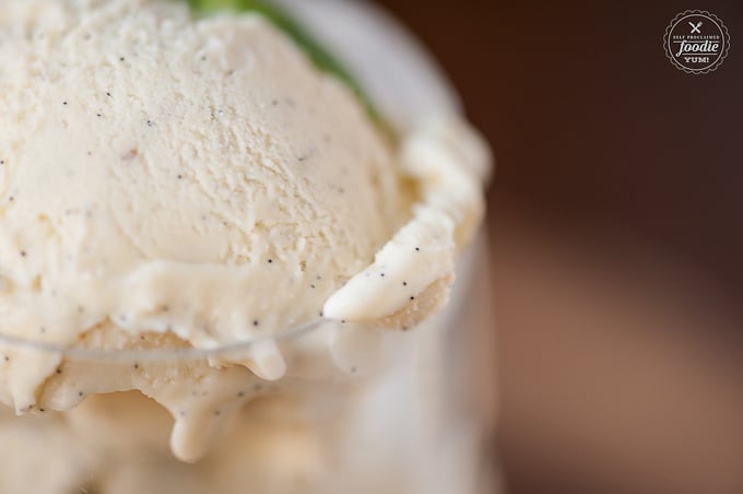 close up photo of vanilla bean ice cream in glass