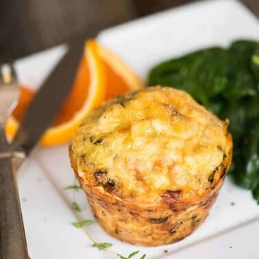 Fall Harvest Egg Muffins, filled with sweet potatoes, greens, and bacon, make for an easy make ahead healthy breakfast option.