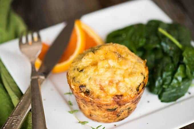 Fall Harvest Egg Muffins, filled with sweet potatoes, greens, and bacon, make for an easy make ahead healthy breakfast option.