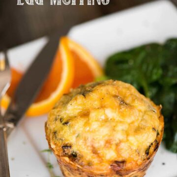 fall harvest egg muffin, with an orange and knife in the background