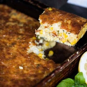 Feta Corn Casserole, made with canned corn and a hint of lemon and basil, takes only minutes to prepare, creating an easy side dish everyone loves.