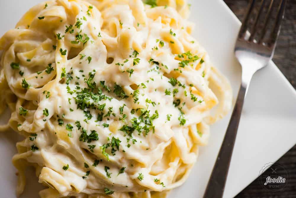 pasta with homemade Alfredo sauce from scratch on plate