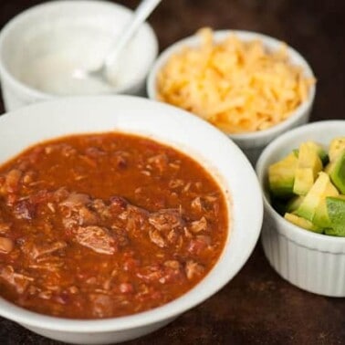 This spicy Five Alarm Steak Chili is the best recipe you'll ever find, plus slow cooking it in the crockpot makes it perfect game day tailgating grub.