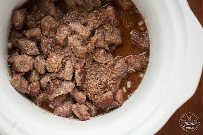 steak pieces in slow cooker