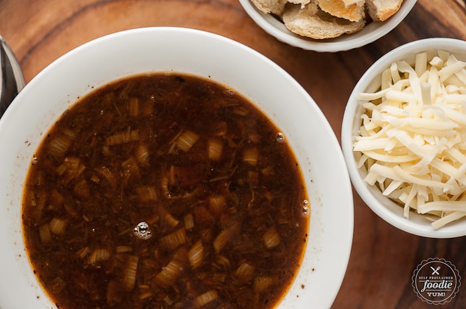 top down view of homemade French Onion Soup in white bowl