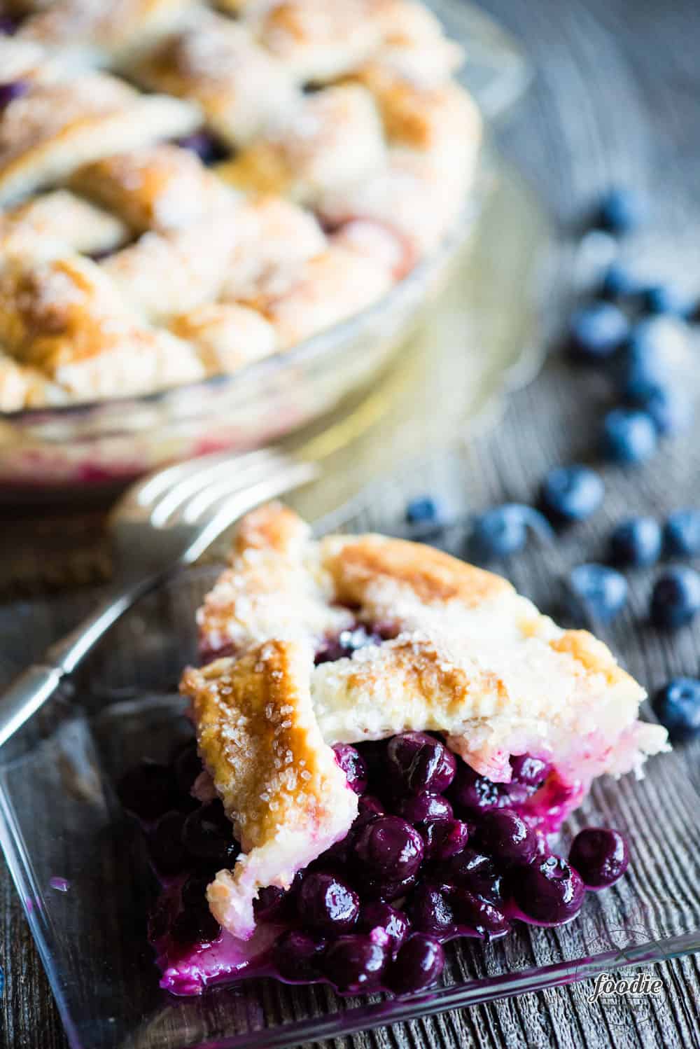 piece of fresh blueberry pie on plate