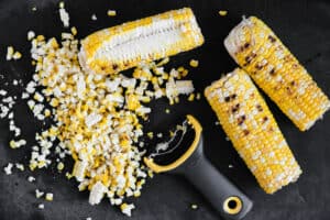 removing kernels of corn from the cob