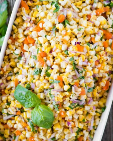 rectangle dish of vegetable salad with corn