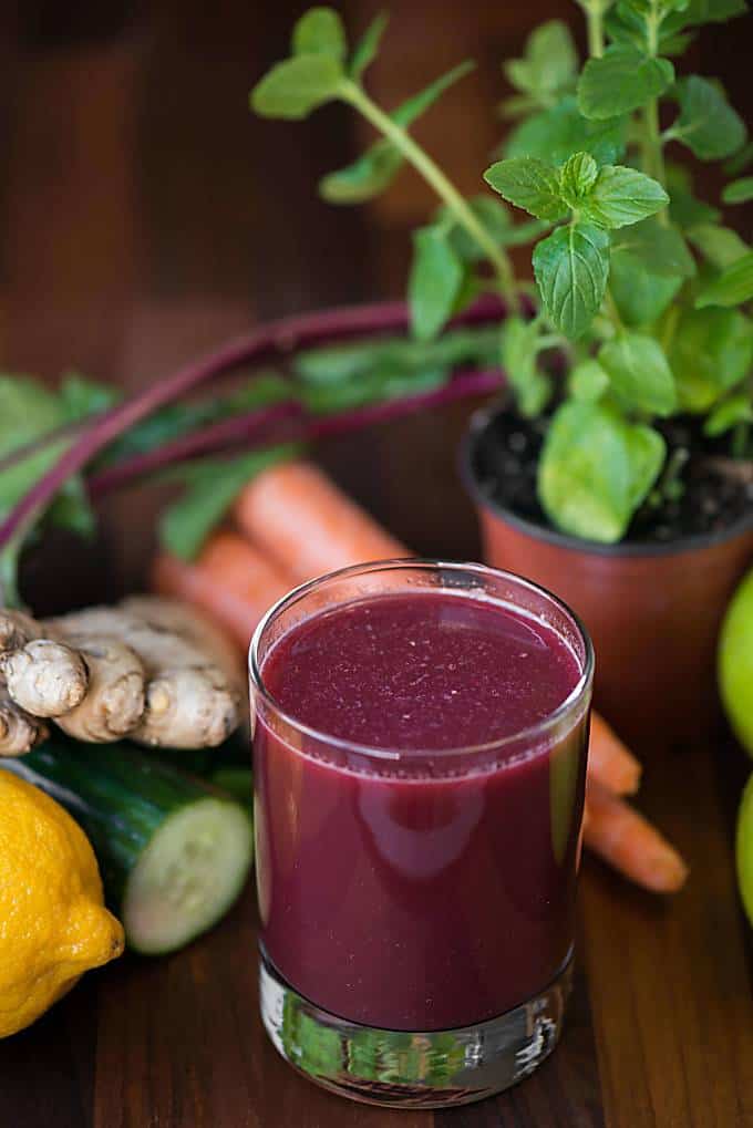 red juice in glass with vegetables