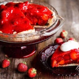 Piece of fresh strawberry pie on plate