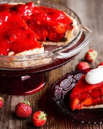 Piece of fresh strawberry pie on plate