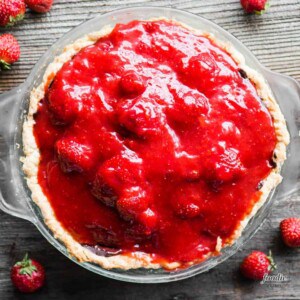 homemade strawberry pie with fresh strawberries.