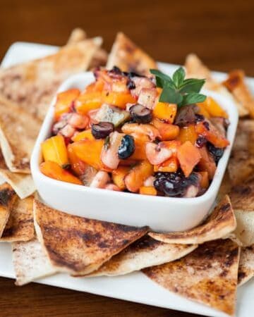 This perfectly sweet Fruit Salsa with homemade Cinnamon Chips will be loved by all and is a fantastic treat that can be served as an appetizer or dessert.