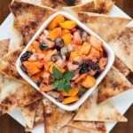 sweet chopped fruit in bowl with cinnamon chips