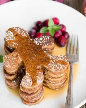 stack of Gingerbread man Pancakes with syrup