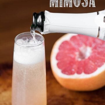 I make my Grapefruit Mimosa a little different than just combining champagne and grapefruit juice and the result is a sweet and flavorful pink cocktail.