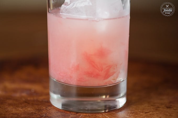 bottom of glass with grapefruit tequila drink
