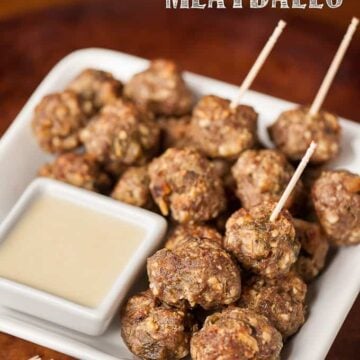 Four ingredient Green Chile Cheddar Meatballs are easy to make, taste fantastic with white cheddar cheese sauce, & can be eaten as a main dish or appetizer.