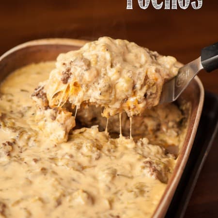 What's better than nachos? Replacing chips with tater tots & creating Tochos, that's what! My Green Chile Tochos with ground beef are perfect for game day.
