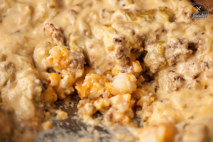 A close up of tater tot casserole with ground beef and cheese
