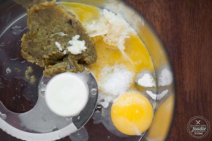 Ingredients in food processor to make aioli with green chile