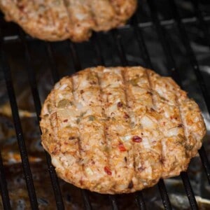spicy turkey burger patty on grill