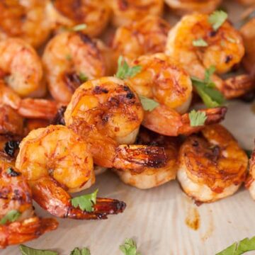 I can't think of a better send off to summer than enjoying dinner outside while feasting on these tasty sweet and spicy Grilled Chipotle Shrimp Skewers.