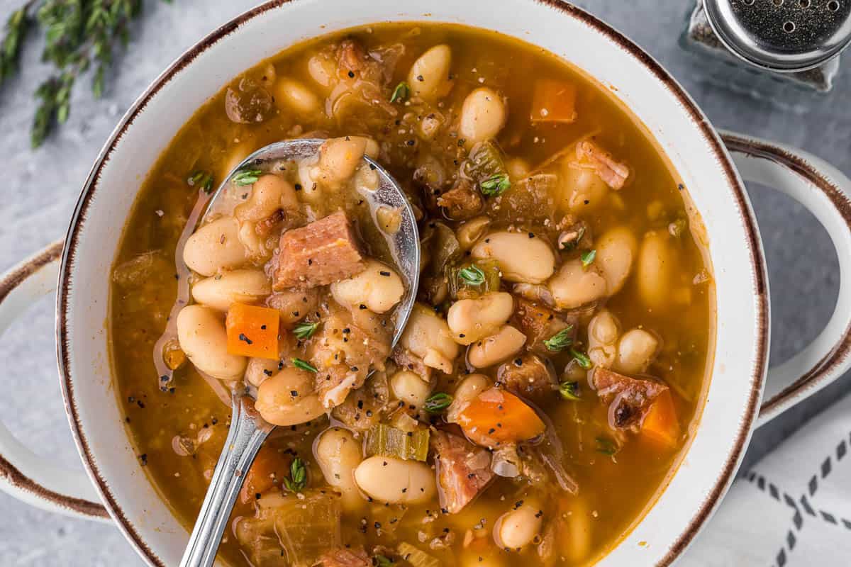 slow cooker ham and bean soup in bowl.