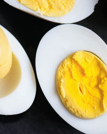 perfectly cooked hard boiled egg cut in half.