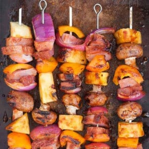 Hawaiian Ham Skewers, made with a pineapple grilling sauce, ham steak, and fresh vegetables, are not only insanely delicious but are super easy to make.