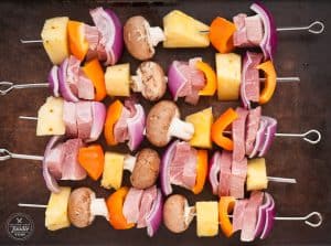 Hawaiian Ham Skewers, made with a pineapple grilling sauce, ham steak, and fresh vegetables, are not only insanely delicious but are super easy to make.
