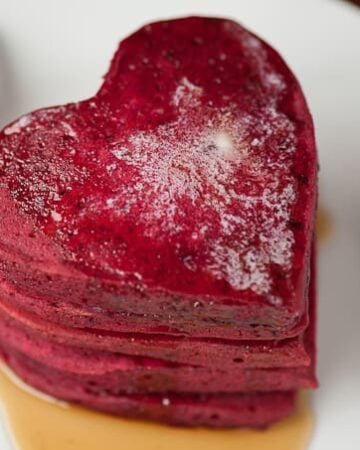 Heart Beet Pancakes are the made with sweet roasted beets and make the most delicious red velvet pancakes that are perfect for Valentine's Day.