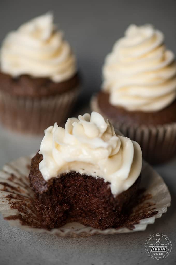 Three frosted Homemade chocolate cupcakes