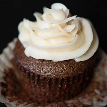 chocolate cupcake with swirl of buttercream frosting on top