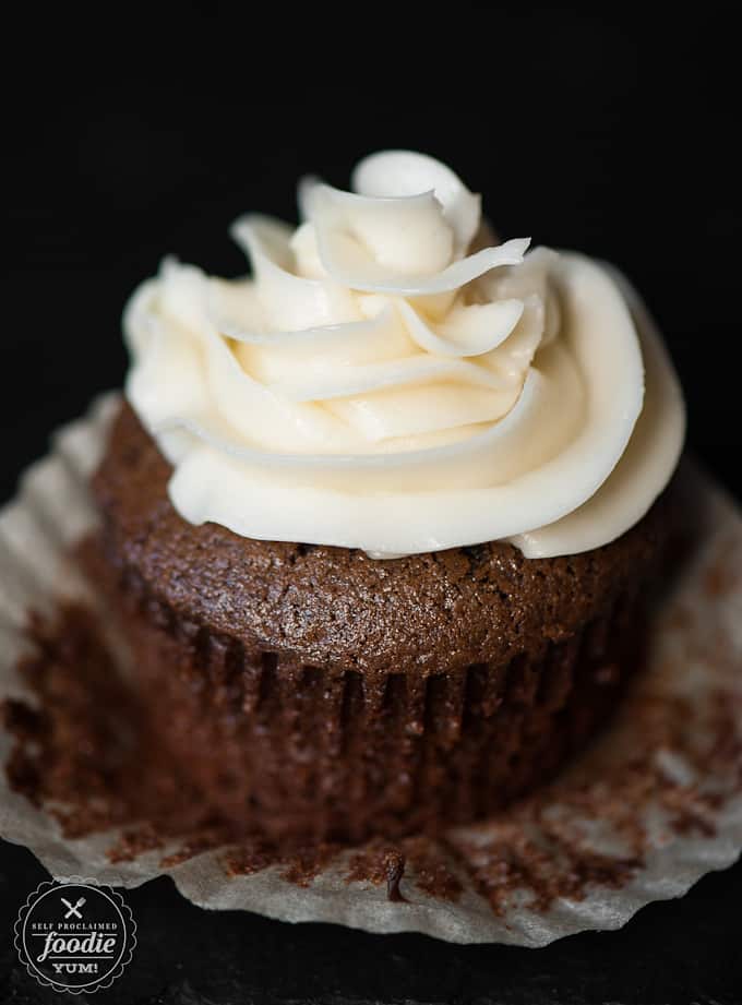 Chocolate cupcakes with swirl of cream cheese frosting
