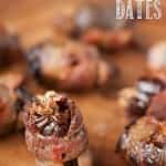 These tasty Holiday Bacon Wrapped Dates are stuffed with holiday goodies like dried cranberries and candied pecans to make the perfect holiday appetizer.