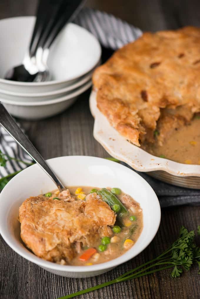 a bowl of chicken pot pie with vegetables
