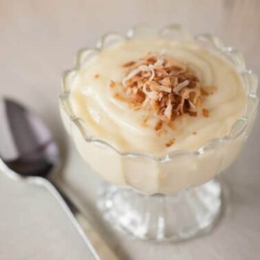 This old fashioned Homemade Coconut Pudding made with coconut milk and coconut cream is the perfect dessert because it is so creamy rich and delicious.